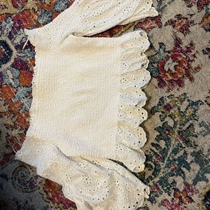 Xl off the shoulder smocked shirt. Embroidered bell sleeves Never worn like new.